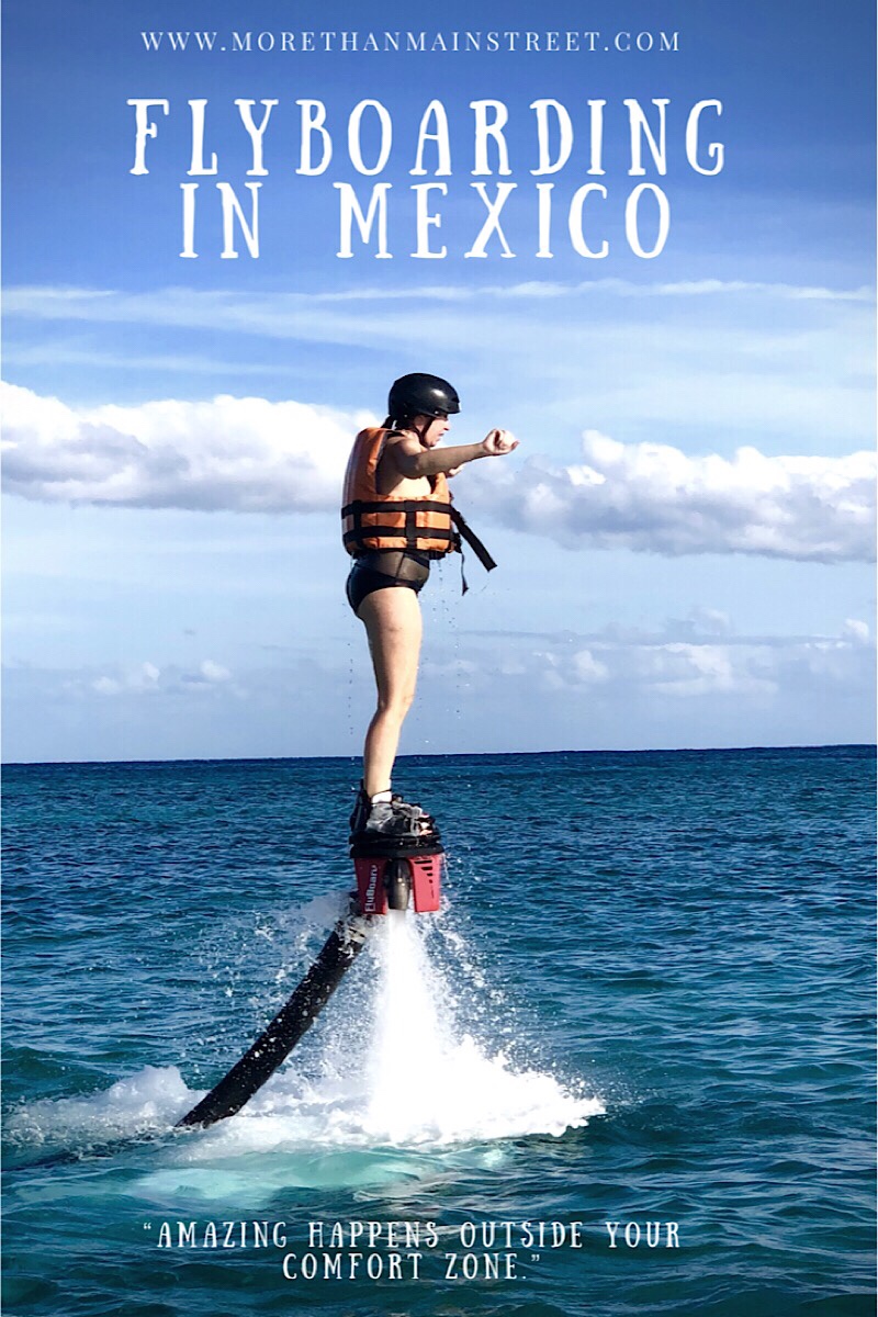 What is flyboarding? A review featured by top family travel blog, More Than Main Street: image of a woman flyboarding for the first time.