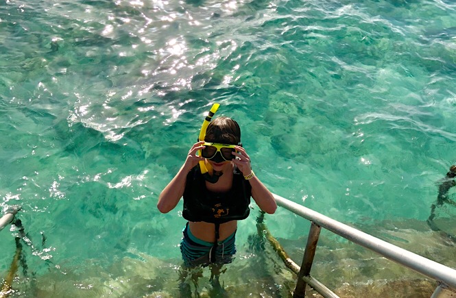 5 Things to Do in Aruba with Kids featured by top US family travel blog, More Than Main Street: snorkeling in aruba with kids