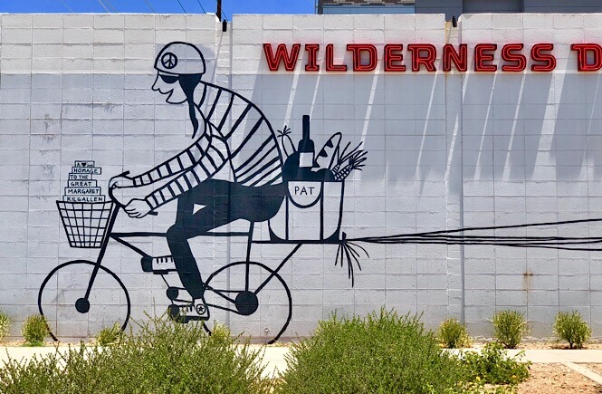 Phoenix Street Art: 11 Incredible Roosevelt Row Murals featured by top US travel blog, More than Main Street: bicycle guy wall mural phoenix arizona
