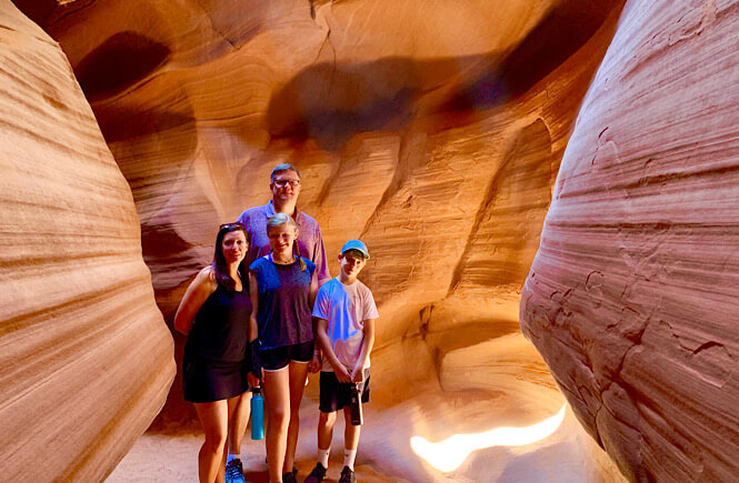 The Best 2 Things To Do in Page Arizona as featured by top US family travel blog, More than Main Street; family in upper antelope canyon