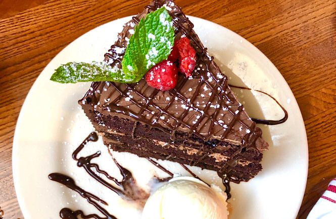 Top 5 Best Family Restaurants in Raleigh NC as featured by top NC travel blog More than Main Street: chocolate cake from the Pit BBQ.