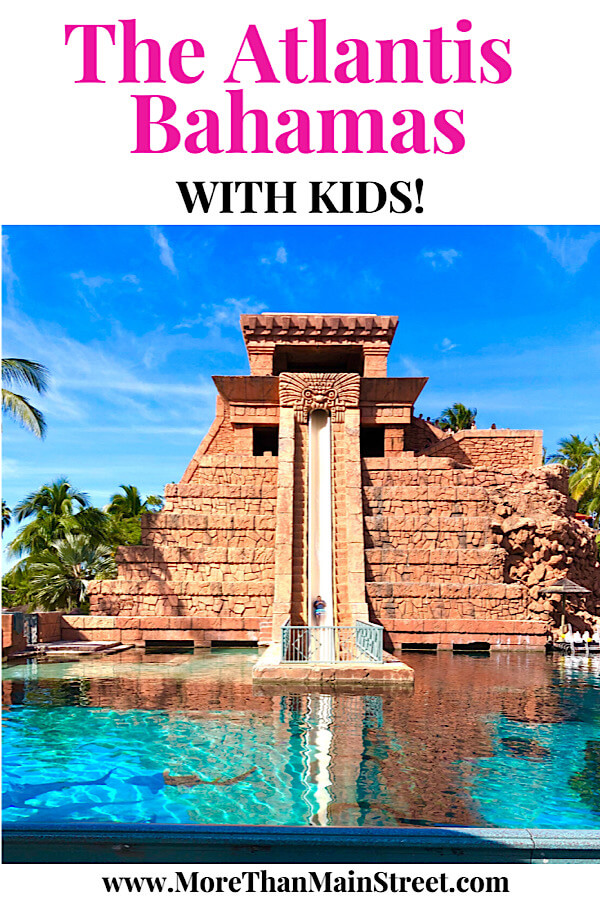 Bahamas Family Vacation: Top 10 Tips for Visiting Atlantis with Kids as featured by top US family travel blog More than Main Street: waterslide.