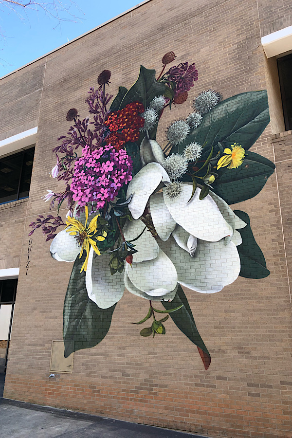 Top 10 Raleigh NC Murals to Visit with your Family featured by top US travel blog More than Main Street; Ouizi mural at NC Museum of Art.