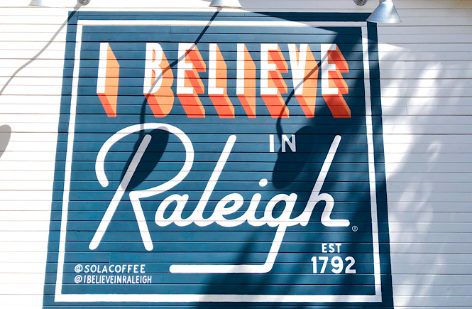 I Believe in Raleigh mural at Sola Coffee Cafe in Raleigh NC along with ten other fun pieces of street art in the Triangle area of NC.