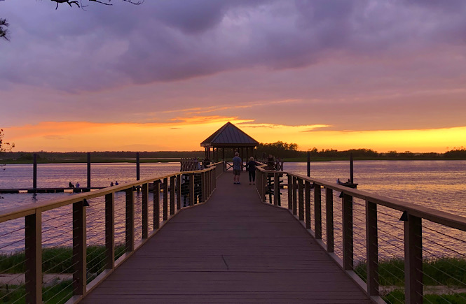 River Lights Boardwalk  is one of the Top 5 Best Places to Watch the Sunset in Wilmington NC featured by top US travel blog, More than Main Street.