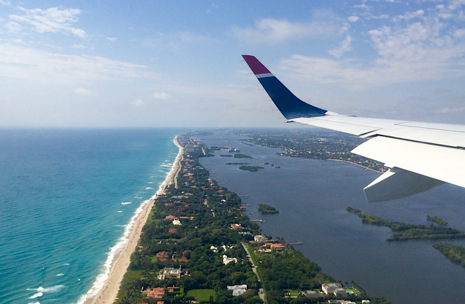 Airplane view of West Palm Beach Florida, one of the best kid friendly beaches on the east coast featured by top US travel blog, More than Main Street.