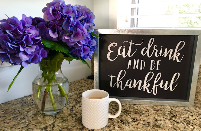 Being Grateful: 100 Unique Things to Be Thankful for featured by top lifestyle blog, More than Main Street. Image of hydrangeas, coffee, and sign that says eat, drink, and be thankful.