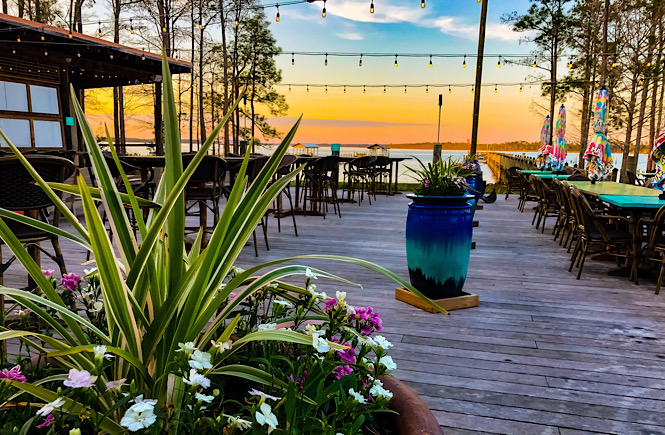 looking out into the sunset in Gulf Shores Alabama on winter vacation