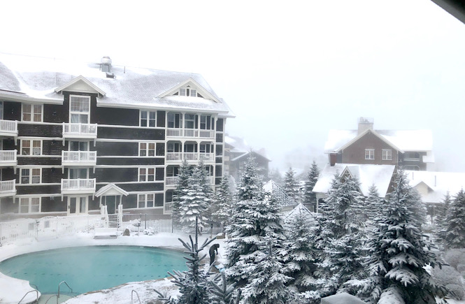 Snow covered hotel and pool at Snowshoe Mountain West Virginia.