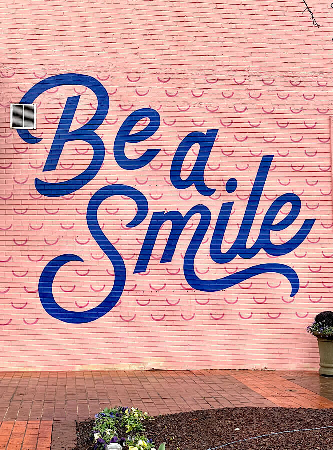 Be a smile mural at Cameron Village in Raleigh NC.