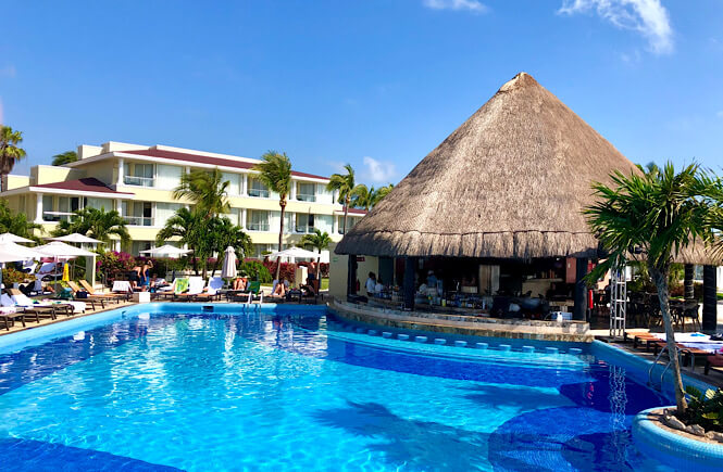 Cancun Moon Palace Resort Review- image of pool and swim up bar.