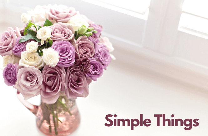 Simple things that can bring joy into each day: image of a bouquet of purple and white roses.