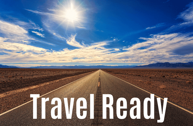 Travel Ready caption with a road and blue sky background.