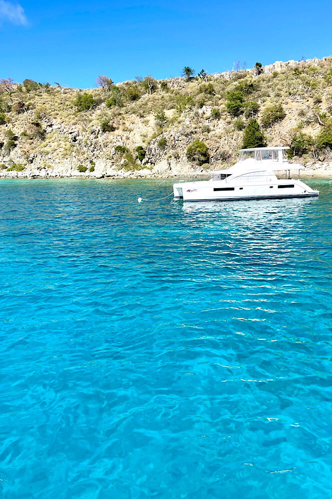 clear water and a catamaran at cooper island bvi