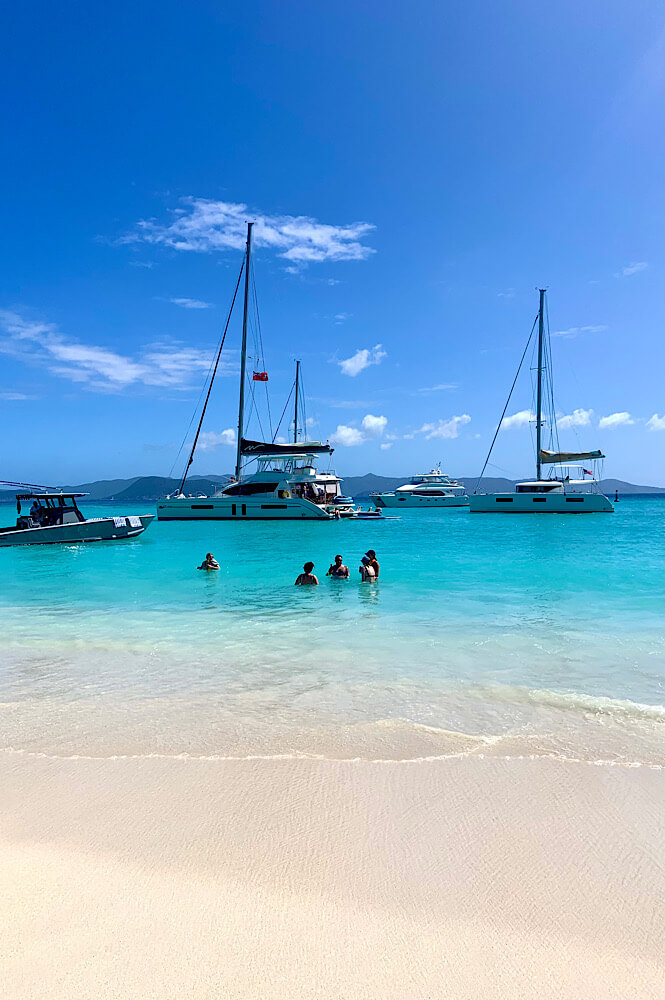 Crystal clear water and white sandy beach on jost van dyke.