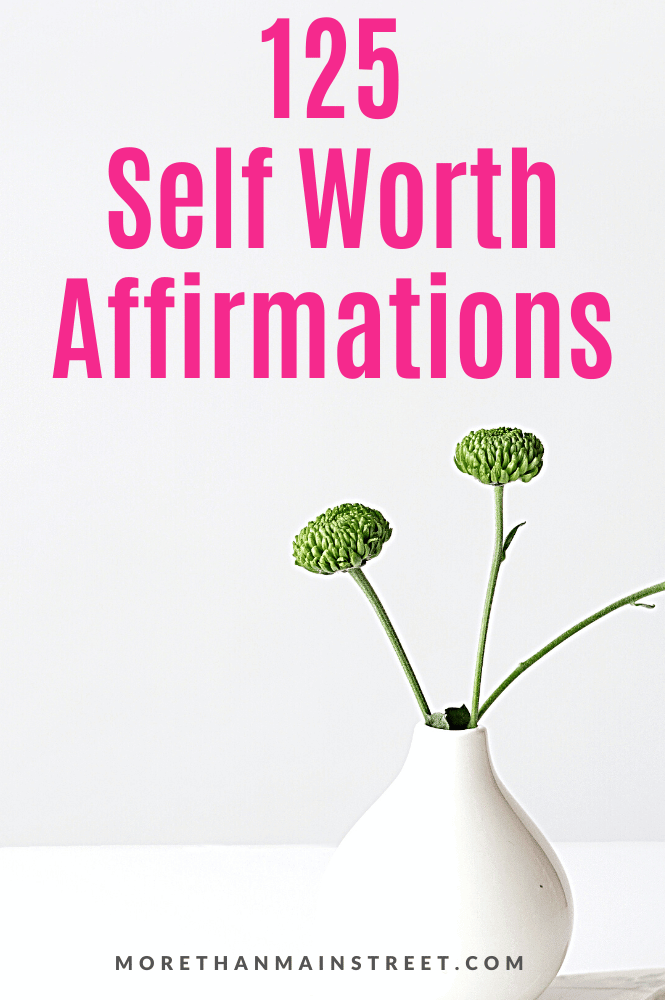 125 self worth affirmations (image is minimal with a white vase and two green flowers)