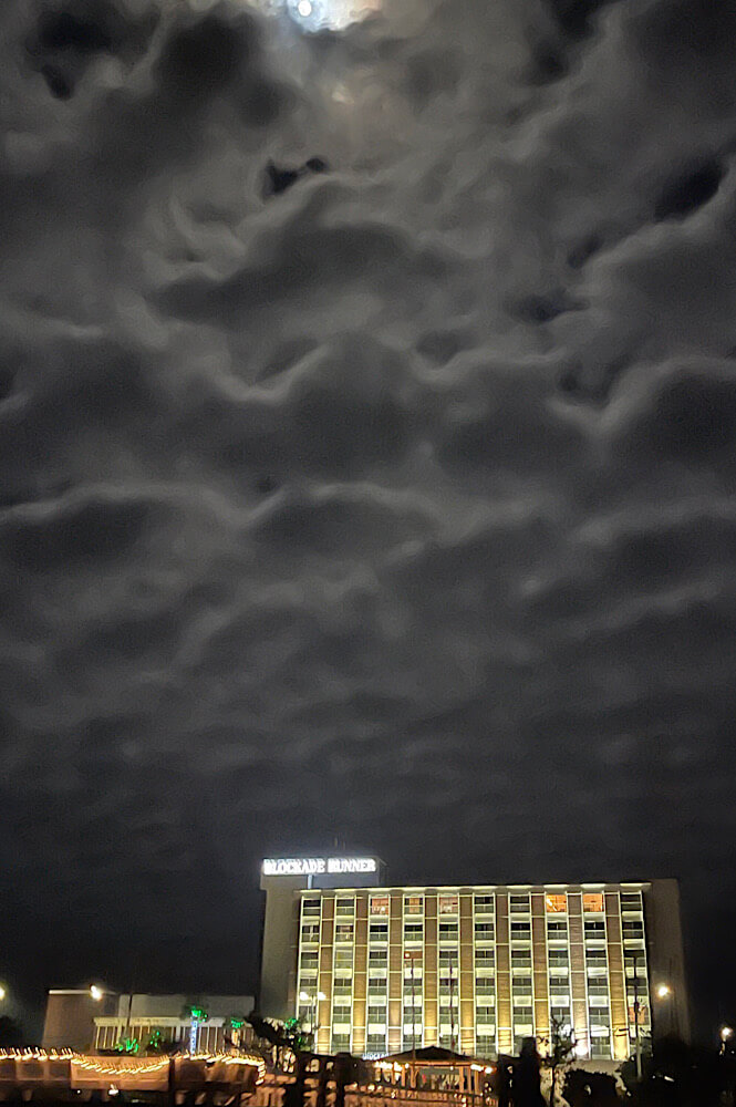 moody photo of the Blockade Runner on Wrightsville Beach NC at night