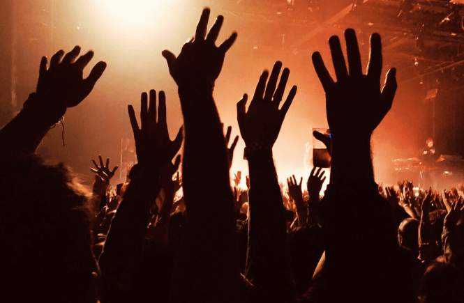 concert Instagram captions (photo of hands in the air at a concert)