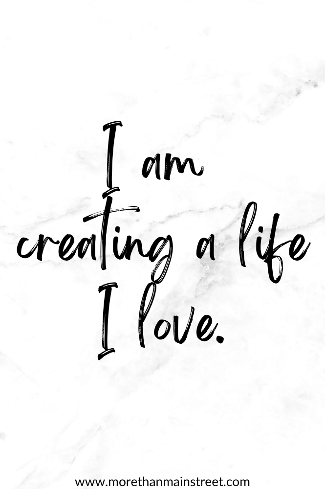 Positive affirmation for self care that reads "I am creating a life I love."