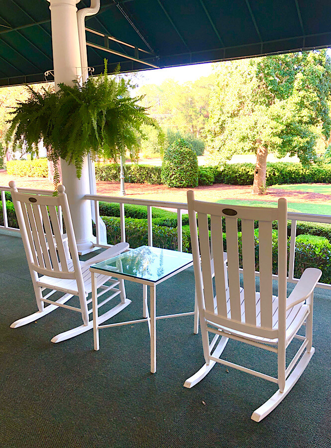 Create a mindful moment each morning while sitting outside on your front porch in one of two white rocking chairs with a green fern where you are truly present before the rush of the day- this could be as simple as writing down things you are grateful for.